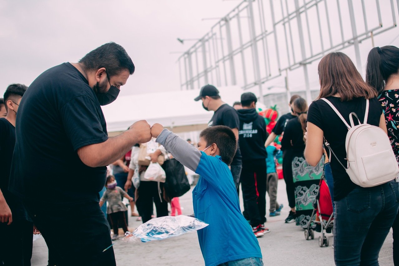 a man and a child greeting with happiness