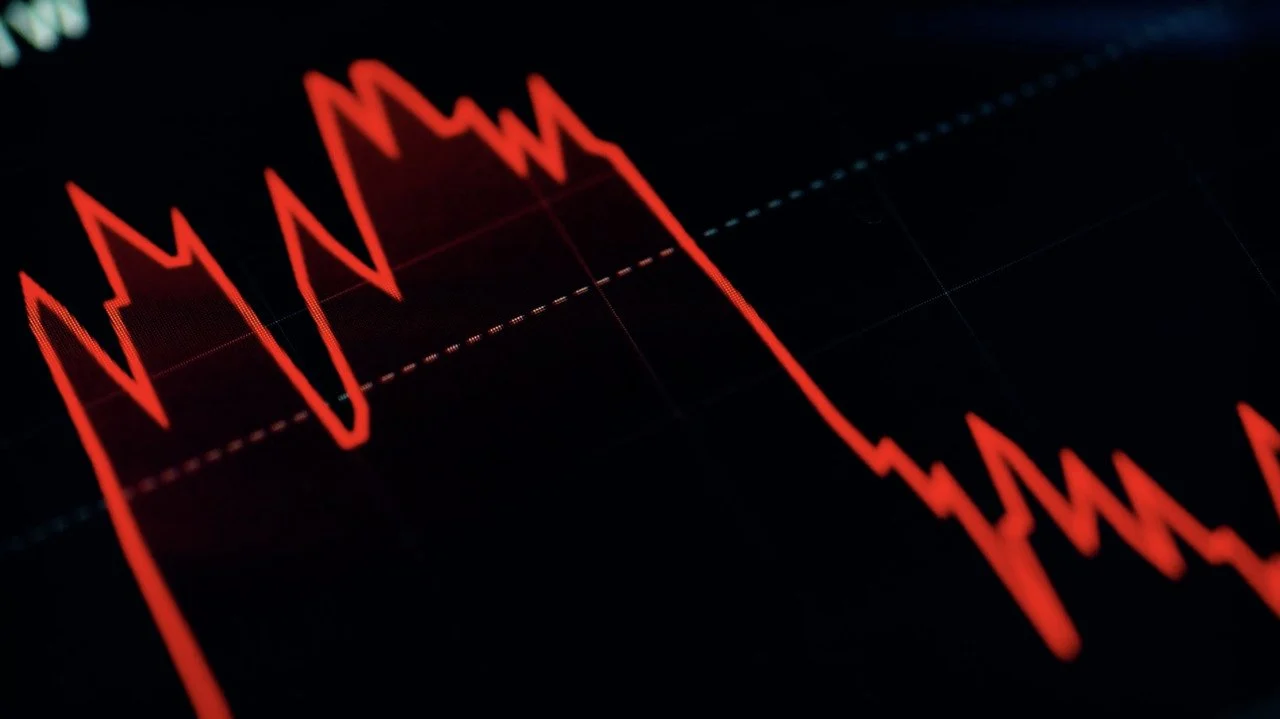 a picture of a red chart showing the website traffic surge and website crash