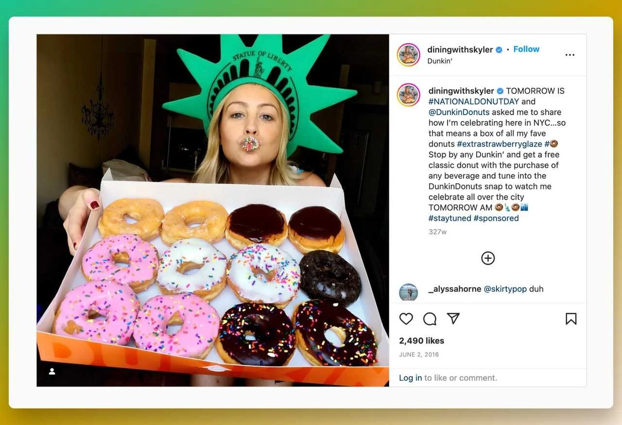 a screenshot of DunkinDonuts Instagram page showing the influencer marketing campaign they did for national donut day