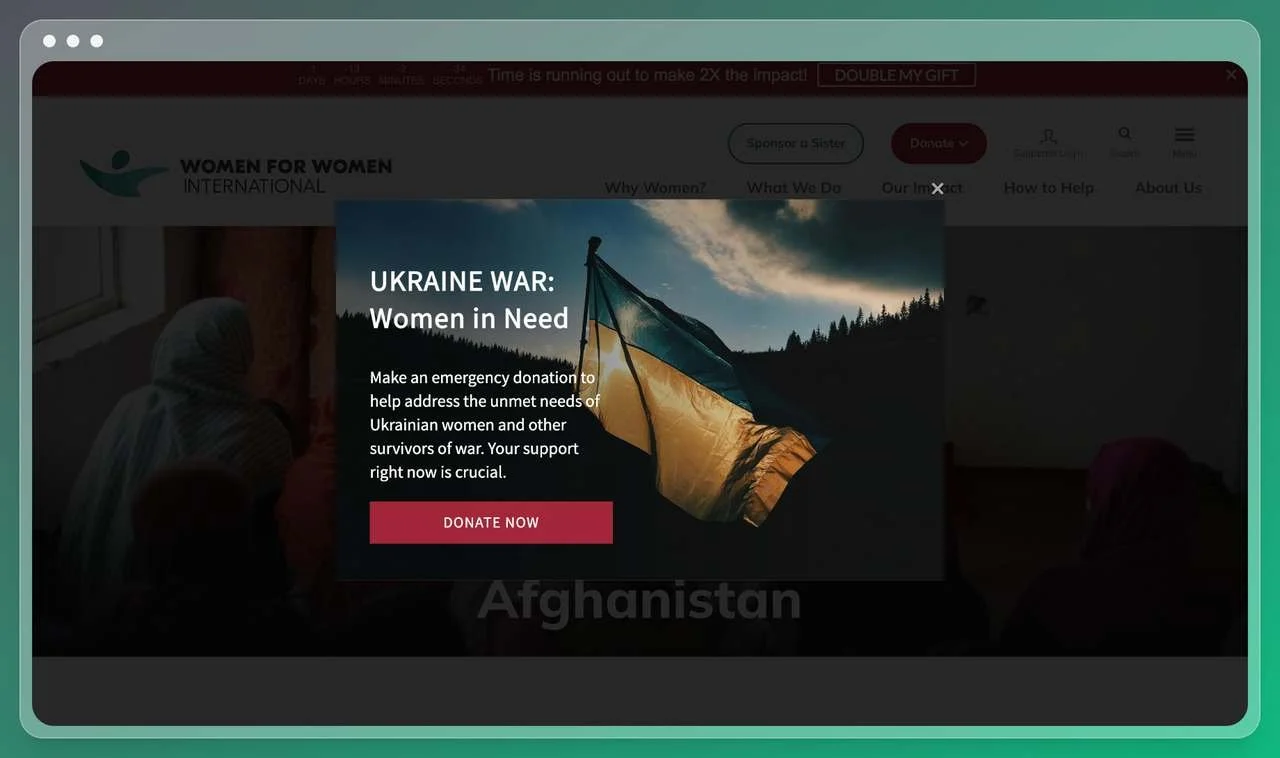 a nonprofit organization's website screenshot with a welcome popup that shows the flag of Ukraine and asks the visitors to take action and help the women in need in the war